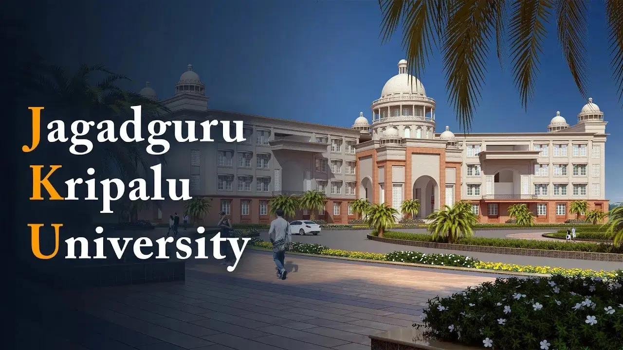 "A grand and elegant view of the main building of Jagadguru Kripalu University, featuring classical architecture with domes, columns, and wide archways. "