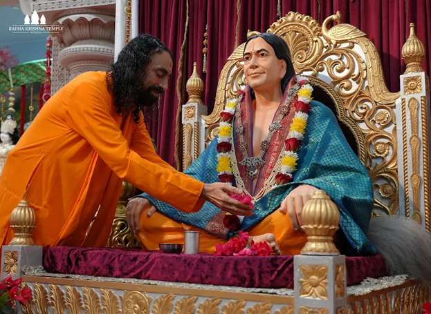 A person touching a statue of a person

AI-generated content may be incorrect.