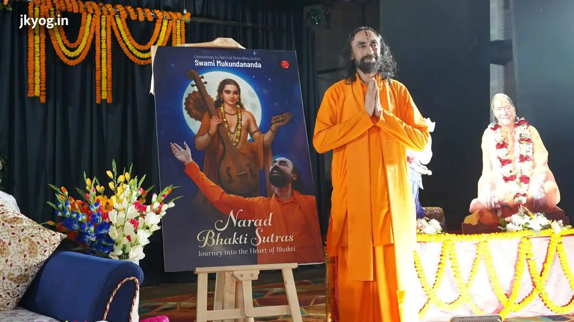 Swami Mukundananda leading a transformative spiritual session, fostering inner peace and wisdom.