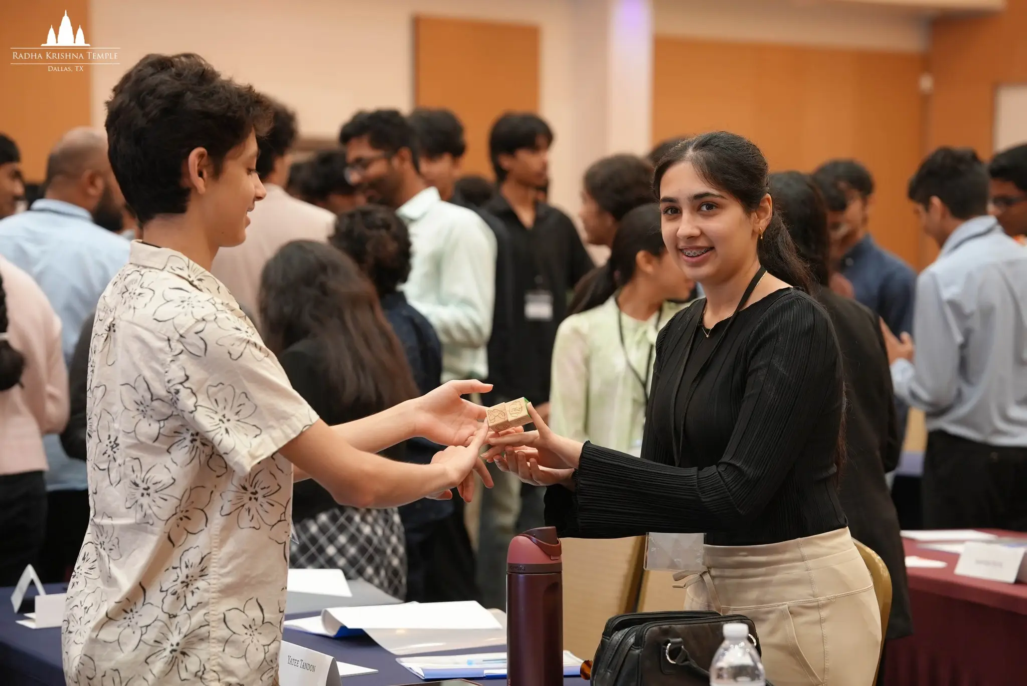 Students participate in a hands-on teamwork activity during the Youth Leadership Workshop at Radha Krishna Temple Dallas.