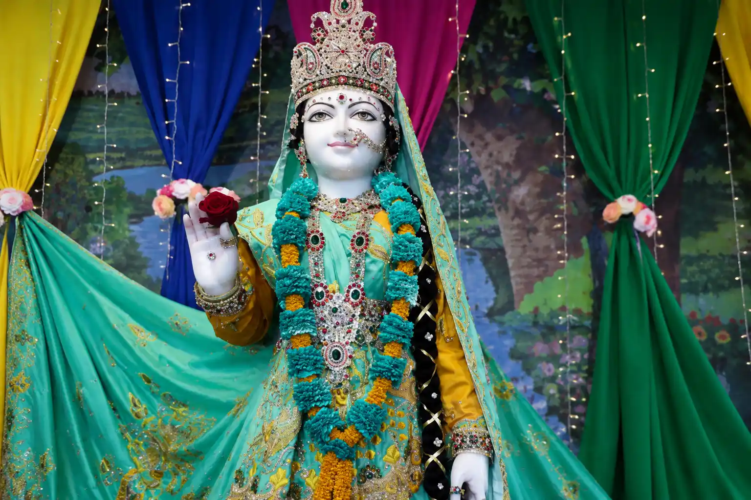 Beautifully adorned deity of Shree Radharani holding a rose during the Mother’s Day celebration at the Bay Area Life Transformation Program 2026.