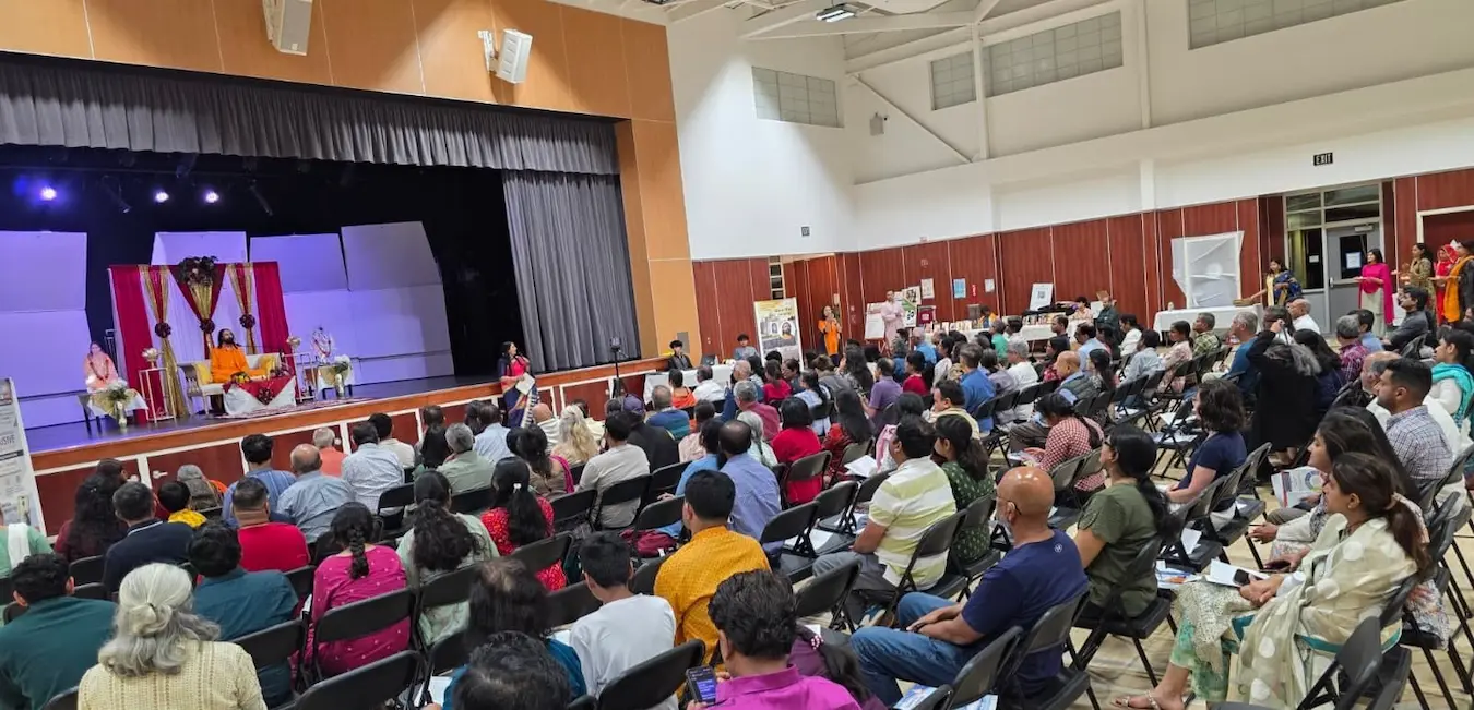 Audience seated during Swamiji discourse in Sacramento
