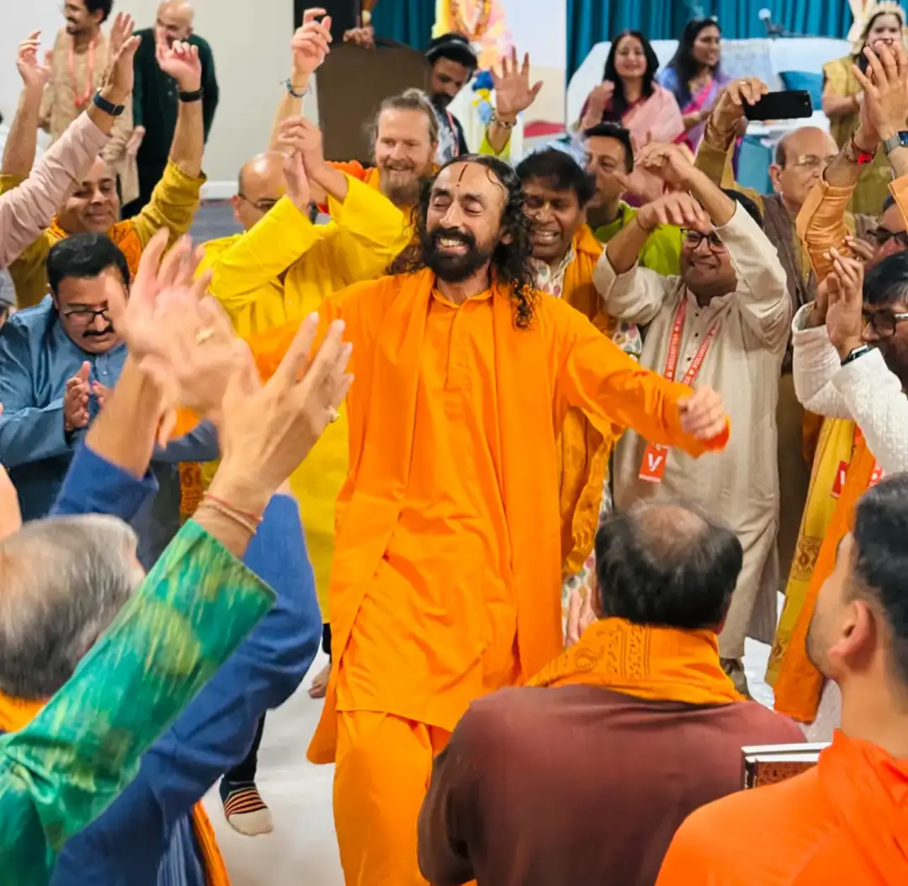 Swami Mukundananda leading the celebrations