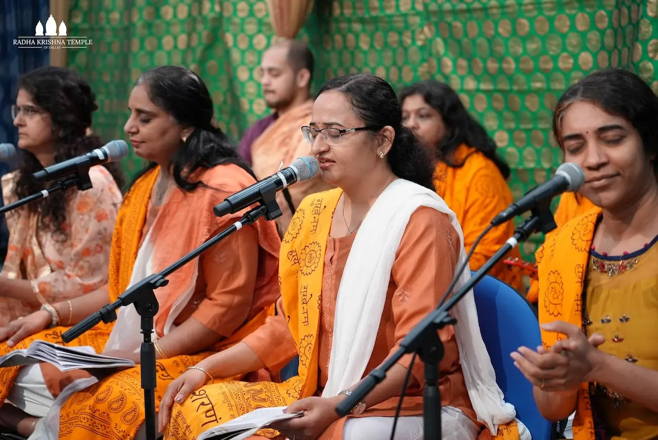 Devotees performing kirtan