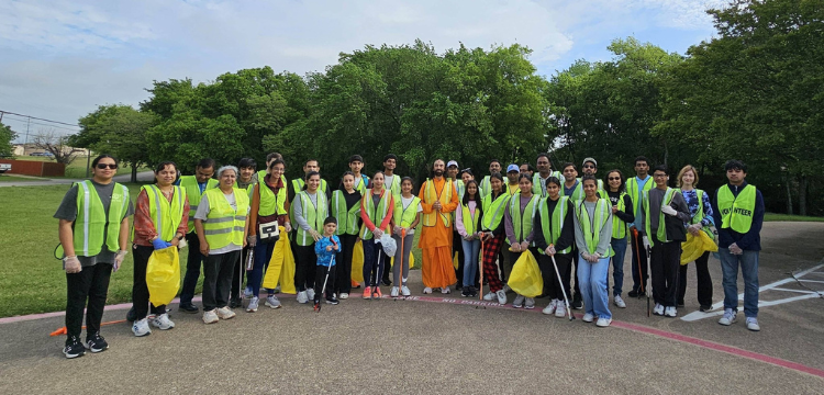 JKYog volunteers serving the community at an outdoor seva event